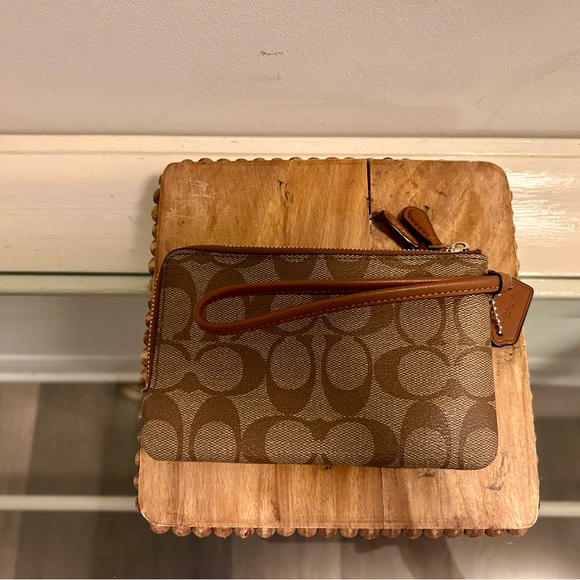 Coach Wristlet in Signature Canvas. - Picture 2 of 10